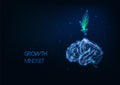 Futuristic growing mindset concept with glowing low polygonal green plant growing from human brain