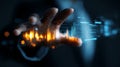 Futuristic hand interacting with glowing digital data charts and graphs in dark environment Royalty Free Stock Photo