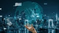 Futuristic Hand Reaching Towards Interactive Global Interface with Data Visualization and Network Connections in a Royalty Free Stock Photo