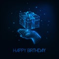 Futuristic happy birthday greeting card with glowing low polygonal human hand holding gift box Royalty Free Stock Photo