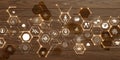 Futuristic hexagonal network of glowing icons on a wooden background, representing data, technology, and interconnectedness Royalty Free Stock Photo