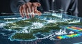 Futuristic holographic display showing global data analytics and urban planning with interactive touch interface Royalty Free Stock Photo