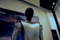 futuristic humanoid robot named Tesla Bot AKA Optimus, modern environment, showcasing advanced robotics technology, engineering,