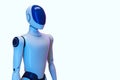 Futuristic humanoid robot with sleek design and glossy blue features standing isolated on light gradient background, symbolizing Royalty Free Stock Photo