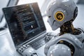 Futuristic humanoid robot using a laptop for programming and coding Royalty Free Stock Photo