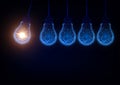 Futuristic idea, innovation, creativity concept with glow low poly light bulbs forming Newton cradle