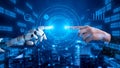 Futuristic Interaction Between Human Hand and Robot Hand in Technology Concept, Digital Interface and Data Visualization Royalty Free Stock Photo