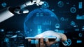 Futuristic Interaction Between Human Hand and Robotic Arm Over Digital Globe Representing Technology, Data, and Royalty Free Stock Photo