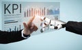 Futuristic Interaction Between Human Hand and Robotic Hand with KPI Analytics Display, Representing Collaboration of Royalty Free Stock Photo