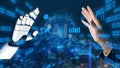 Futuristic Interaction Between Human Hand and Robotic Hand Symbolizing Cooperation in Artificial Intelligence and Royalty Free Stock Photo