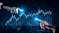 Futuristic interaction between human hand and robotic hand showcasing collaboration in technology, finance, and Royalty Free Stock Photo
