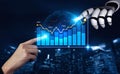 Futuristic interaction between human and robot with data visualization showing growth, technology advancement, finance Royalty Free Stock Photo