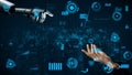 Futuristic Interaction Between Robot Hand and Human Hand with Digital Data Visualization in Background xenic Royalty Free Stock Photo