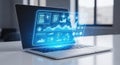 Futuristic laptop displaying glowing blue digital data and analytics charts Royalty Free Stock Photo