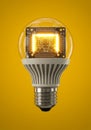 Futuristic LED light bulb with a glowing microchip and digital circuit