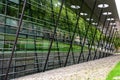 Futuristic library with reflections on windows.