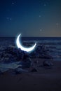 Futuristic Moon illustration. Glowing neon moon on a beach . Fluorescence moon night color pallet. Layout for poster, banner, part