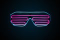 Futuristic neon glasses isolated on dark background