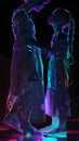 Futuristic neon-hued statue of a woman and child