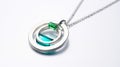 Futuristic Optics Pendant With Emerald In Silver And Stainless Steel