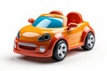 Futuristic orange toy car on white background. Cartoonish vehicle designed for children. Concept of kids friendly toys