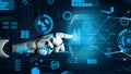 Futuristic Robot Hand Interacting with Advanced Technology Display, Visualizing Data and Digital Interfaces in a High Royalty Free Stock Photo