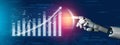 Futuristic Robot Hand Interacting with Data Visualization and Financial Graph for Business Growth Concept Impute Royalty Free Stock Photo