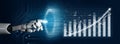 Futuristic Robot Hand Interacting with Digital Graph Illustrating Growth and Progress in Technology and Data Analysis Royalty Free Stock Photo