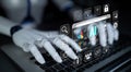 Futuristic Robot Hand Interacting with Digital Interface Displaying AI Analytics and Secure Data Visualizations Quark Royalty Free Stock Photo