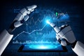 Futuristic Robot Hand Interacting with Graphs and Data on Digital Tablet Screen in High-Tech Environment Representing AI Royalty Free Stock Photo