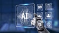Futuristic robot hand interacting with virtual AI interface icons showcasing technology, data analysis, and artificial Royalty Free Stock Photo