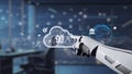 Robot hand interacting with cloud computing icons and digital data exchange symbols in a futuristic office environment Royalty Free Stock Photo