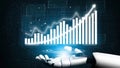 Futuristic Robot Hand Presenting Digital Growth Chart Representing Technology Innovation and Data Analysis in Business Royalty Free Stock Photo