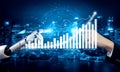 Futuristic Robot Hand Touching Human Hand with Digital Graphs and Data Visualization on Night City Background Impute Royalty Free Stock Photo