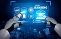 Futuristic Robot Hands Interacting with Virtual Banking Interface and Data Visualization in Digital Financial Royalty Free Stock Photo