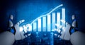 Futuristic Robot Hands Presenting Growth Chart in Digital Workspace with Blue Background and High-Tech Elements Impute Royalty Free Stock Photo
