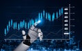 Futuristic robotic hand analyzing financial data on a digital screen with graphs and charts in a high-tech business Royalty Free Stock Photo