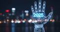 Futuristic Robotic Hand with Glowing Circuitry and Year 2025 Display Against City Lights Royalty Free Stock Photo