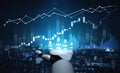 Futuristic robotic hand displaying data visualization with rising graphs and statistics representing advanced technology Royalty Free Stock Photo