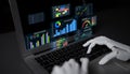 Futuristic robotic hand interacting with data visualization dashboard on laptop screen showcasing analytics, charts Royalty Free Stock Photo