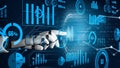 Futuristic Robotic Hand Interacting with Data Visualization and Graphs in a Digital Environment Representing Advanced Royalty Free Stock Photo