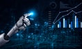Futuristic robotic hand interacting with digital data visualization and graphs in tech environment representing AI and Royalty Free Stock Photo