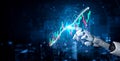 Futuristic Robotic Hand Interacting with Digital Financial Graphs and Data in a High-Tech Environment Impute Royalty Free Stock Photo
