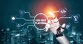 Futuristic Robotic Hand Interacting with Low Code Platform Concept in High-Tech Cityscape Background at Night Quark Royalty Free Stock Photo