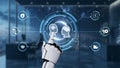 Futuristic robotic hand interacts with AI concept featuring brain graphics and connected icons in modern office Royalty Free Stock Photo