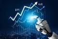 Futuristic robotic hand interacting with digital financial chart displaying upward trends and percentages amidst a city Royalty Free Stock Photo