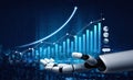 Futuristic robotic hand presenting data visualization with graphs and charts illustrating rising trends and analytics in Royalty Free Stock Photo