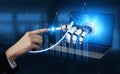 Futuristic robotic hand reaching towards a human finger with charts and data analytics, symbolizing artificial Royalty Free Stock Photo