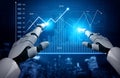 Futuristic Robotic Hands Interacting with Digital Graphs and Data Visualizations in High-Tech Environment for Financial Royalty Free Stock Photo