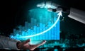 Innovative Technology Concept Depicting a Robotic Hand Interacting with Data Visualization Graphs Representing Growth Royalty Free Stock Photo